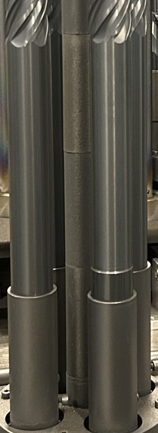 Blue Steel coated long cutting tools in a production fixture